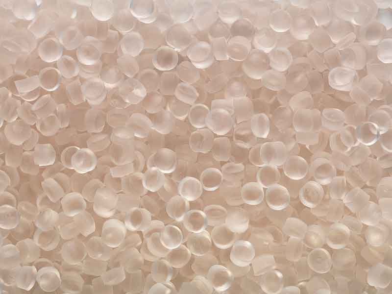 Pink granules from a BUSS compounding system after PVC-P compounding